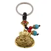 Breloc Feng Shui Amuleta cu nod mistic si sacul prosperitatii auriu, 9cm