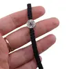 Bratara cu nod culisant negru si medalion rotund argintiu cu cristal albastru, imagine 3