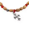 Bratara pe elastic cu lemn natural, margele rosii si charm cruce stilizata, imagine 2