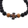 Bratara pe elastic cu margele negre, lemn natural si cruce centrala, imagine 2