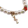 Bratara pe elastic cu perle, margele rosii si cruci charm, imagine 2