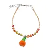 Bratara din fibre naturale cu margele colorate si accesoriu piersica