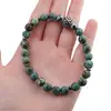 Bratara pe elastic Turcoaz African si Hematit sfere 8mm cu element argintiu in cutie cadou, imagine 3