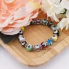 Bratara Feng Shui pe elastic cu ochi protectori multicolori si elemente argintii, imagine 2