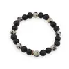 Bratara pe elastic cu Roca vulcanica, Jasp dalmatian si Onix negru mat sfere 8mm