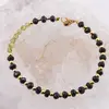 Bratara Turmalina neagra discuri fatetate 4-5mm si Peridot banuti 3-4mm cu bumbi aurii, imagine 2