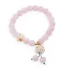Bratara pe elastic cu Cuart roz sfere 8mm si charm Maneki Neko