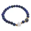 Bratara Lapis lazuli sfere 6mm, Larvikit 8mm si steluta din Sidef 10mm cu bumbi aurii
