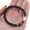 Bratara Onix negru mat sfere 6mm, Larvikit 8mm si steluta din Sidef 10mm cu bumbi aurii, imagine 3