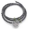 Bratara tripla ajustabila cu pietre semipretioase, Hematit sfere 4mm cu charm floare de lotus si zirconiu verde