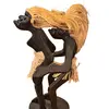 Statueta africana din lemn, unul dupa altul