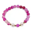 Bratara pe elastic Perle de cultura, bumbi aurii si Agat roz mat sfere 8mm