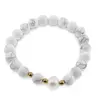 Bratara pe elastic Perle de cultura, bumbi aurii si Howlit sfere mate 8mm