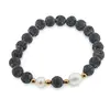 Bratara pe elastic Perle de cultura, bumbi aurii si Roca vulcanica sfere 8mm