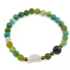 Bratara Agat verde sfere fatetate 6mm, Larvikit 8mm si luna din Sidef 12mm cu bumbi aurii