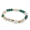 Bratara Magnezit si Malachit sfere 6mm cu bumbi aurii si steluta din Sidef 10mm, imagine 2
