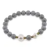 Bratara pe elastic Perle de cultura, bumbi aurii si Cuart druzy electroplacat gri sfere 8mm
