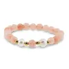Bratara pe elastic Perle de cultura, bumbi aurii si Cuart piersica sfere 8mm, imagine 2