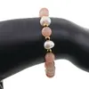Bratara pe elastic Perle de cultura, bumbi aurii si Cuart piersica sfere 8mm, imagine 3