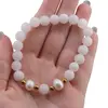 Bratara pe elastic Perle de cultura, bumbi aurii si Cuart sfere mate 8mm, imagine 4