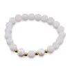 Bratara pe elastic Perle de cultura, bumbi aurii si Cuart sfere mate 8mm