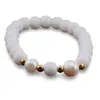 Bratara pe elastic Perle de cultura, bumbi aurii si Onix alb sfere mate 8mm, imagine 2