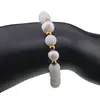 Bratara pe elastic Perle de cultura, bumbi aurii si Onix alb sfere mate 8mm, imagine 3