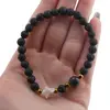 Bratara Roca vulcanica sfere 6mm, Larvikit 8mm si steluta din Sidef 10mm cu bumbi aurii, imagine 4