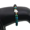 Bratara Crisocola sfere 6mm, Larvikit 8mm si steluta din Sidef 10mm cu bumbi aurii, imagine 3