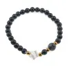 Bratara Goldstone albastru sfere 6mm, Larvikit 8mm si steluta din Sidef 10mm cu bumbi aurii