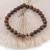 Bratara pe elastic Ochi de tigru sfere 6mm si cruce, imagine 2