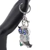 Breloc argintiu bufnita emailata cu aripi negre si ochi protectori, 12cm, imagine 2