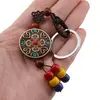Breloc tibetan rotund cu model dublu dorje, margele rosii galbene albastre, 14cm, imagine 3