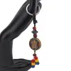 Breloc tibetan rotund cu model Kalachakra, margele rosii galbene albastre, 14cm, imagine 2