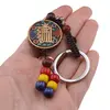 Breloc tibetan rotund cu model Kalachakra, margele rosii galbene albastre, 14cm, imagine 3