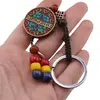 Breloc tibetan rotund cu model mantra, margele rosii galbene albastre, 14cm, imagine 3
