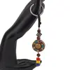 Breloc tibetan rotund cu model scoica aurie, margele rosii galbene albastre, 14cm, imagine 2