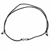 Bratara reglabila pe snur negru cu Larimar discuri fatetate 3mm si un bumb de aur