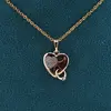 Pandantiv din cupru placat cu aur roz 18k, model inima cu charm si zirconii, imagine 2