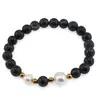 Bratara pe elastic Perle de cultura, bumbi aurii si Agat negru spider sfere 8mm