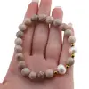 Bratara pe elastic Perle de cultura, bumbi aurii si Coral fosilic sfere 8mm, imagine 3