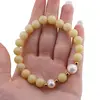 Bratara pe elastic Perle de cultura, bumbi aurii si Jad olive sfere 8mm, imagine 3