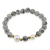 Bratara pe elastic Perle de cultura, bumbi aurii si Jasp kiwi sfere 8mm