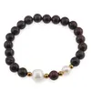 Bratara pe elastic Perle de cultura, bumbi aurii si Jasp poppy sfere 8mm