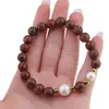 Bratara pe elastic Perle de cultura, bumbi aurii si Jasp rainbow sfere 8mm, imagine 3