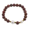 Bratara pe elastic Perle de cultura, bumbi aurii si Jasp rainbow sfere 8mm