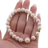 Bratara pe elastic Perle de cultura, bumbi aurii si Magnezit sfere 8mm, imagine 3