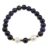 Bratara pe elastic Perle de cultura, bumbi aurii si Ochi de tigru mov sfere 8mm
