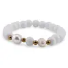 Bratara pe elastic Perle de cultura, bumbi aurii si Onix alb sfere 8mm, imagine 2