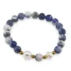 Bratara pe elastic Perle de cultura, bumbi aurii si Sodalit deschis sfere 8mm